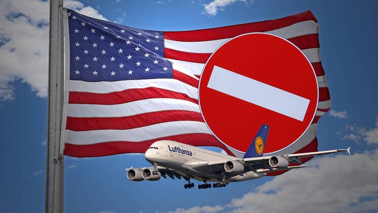 Fear of the corona virus, entry stop in the USA for 30 days of travel from Europe to the USA in force Photomontage, symbolic image, a US American flag, in front of it an aircraft of the airline Lufthansa, Airbus A380 800 Germany Identification D AIMN on approach and a sign Prohibition of entry Symbol image, entry stop in the USA 14 03 2020 in Siegen Germany