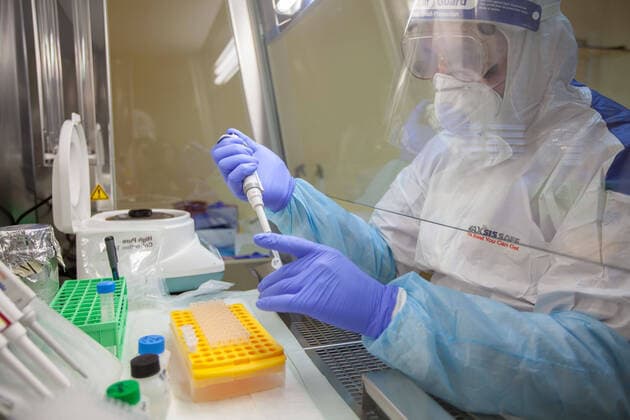 Coronavirus in Israel, Test-Labor in Bethlehem (200314) -- BETHLEHEM, March 14, 2020 (Xinhua) -- A medical technician works at a novel coronavirus detection lab in the West Bank city of Bethlehem on March 14, 2020. (Photo by Luay Sababa Xinhua) MIDEAST-BETHLEHEM-COVID-19 