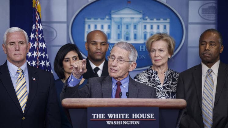 Director of the National Institute of Allergy and Infectious Diseases Dr. Anthony Fauci, with Vice President Mike Pence (L) and members of the coronavirus taskforce, responds to a question from the news media during a COVID-19 coronavirus press conference at the White House in Washington, DC on Saturday, March 2020. To date there are 2175 confirmed cases of COVID-19 coronavirus in the US with 50 deaths.  WAX20200314206 SHAWNxTHEW