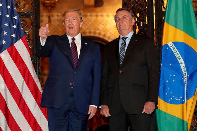March 7, 2020, Palm Beach, FL, United States: U.S. President Donald Trump, left, gives a thumbs up to the photographers after welcoming Brazilian President Jair Bolsonaro for a dinner at the Mar a Lago resort March 7, 2020 in Palm Beach, Florida. Palm Beach United States - ZUMAp138 20200307_zaa_p138_010 Copyright: xAlanxSantos PresidentxBrazilx