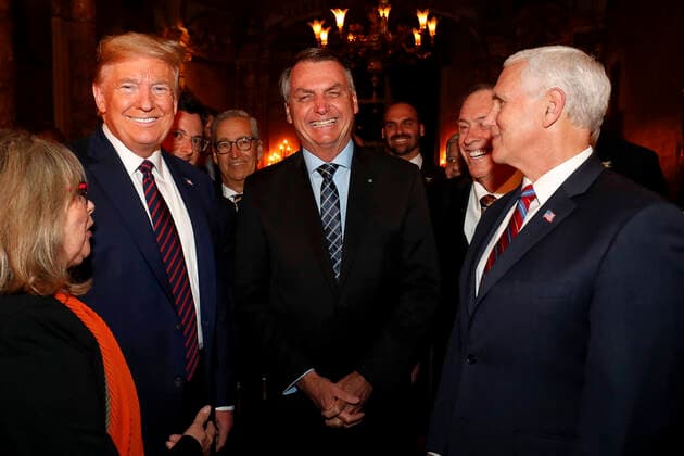 March 7, 2020, Palm Beach, FL, United States: Brazilian President Jair Bolsonaro, center, chats with U.S. President Donald Trump, left, and U.S. Vice President Mike Pence before a dinner at the Mar a Lago resort March 7, 2020 in Palm Beach, Florida. Palm Beach United States - ZUMAp138 20200307_zaa_p138_013 Copyright: xAlanxSantos PresidentxBrazilx