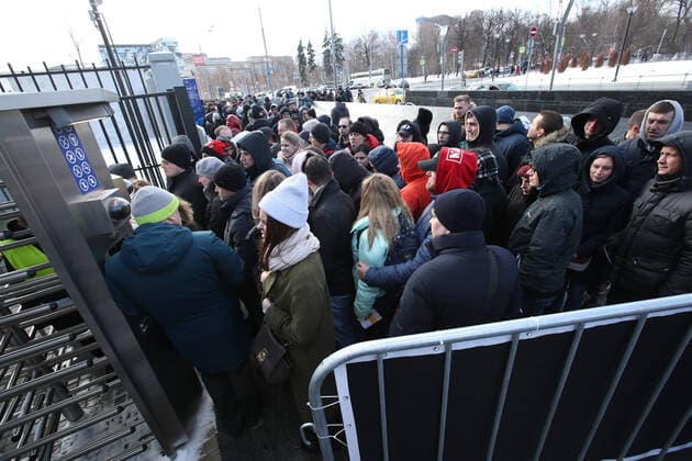 MOSCOW, RUSSIA - MARCH 15, 2020: Fans outside VTB-Arena ahead of a concert by the German-Swedish industrial metal duo Lindemann. The Lindemann duo created by Rammstein vocalist Till Lindemann and Swedish musician Peter Tagtgren, is to give a day and a night concert at the stadium following Moscow Mayor Sergei Sobyanin s decree banning public events with over 5 thousand participants in Moscow due to the coronavirus threat till April 10, 2020. Vyacheslav Prokofyev TASS  TS0D226E