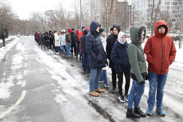 MOSCOW, RUSSIA - MARCH 15, 2020: Fans outside VTB-Arena ahead of a concert by the German-Swedish industrial metal duo Lindemann. The Lindemann duo created by Rammstein vocalist Till Lindemann and Swedish musician Peter Tagtgren, is to give a day and a night concert at the stadium following Moscow Mayor Sergei Sobyanin s decree banning public events with over 5 thousand participants in Moscow due to the coronavirus threat till April 10, 2020. Vyacheslav Prokofyev TASS  TS0D228C