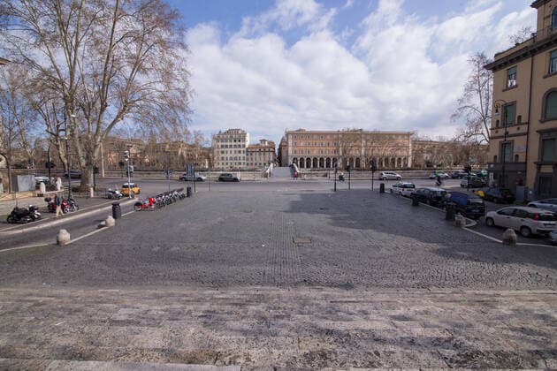Rome: Trastevere district after March 11th Decree View of Piazza Trilussa Trastevere district in Rome and Ponte Sisto with a few people on the morning of 15 March 2020, after the Italian Government Law Decree of 11 March 2020 which establishes the closure of shops and the prohibition of people leaving the house except for work or mandatory reasons, due to the epidemic of the Covid-19 Roma Italy Copyright: MatteoxNardone