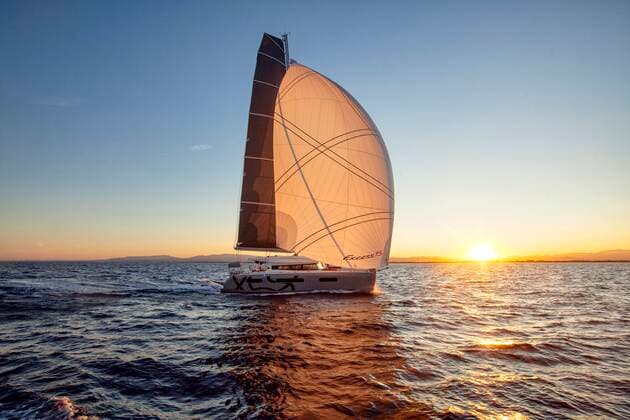 Catamaran cruising during sunset time under sails. Canet-en-Roussillon, Occitanie, France ,editorial use only CR_CHLA200203-250985-01