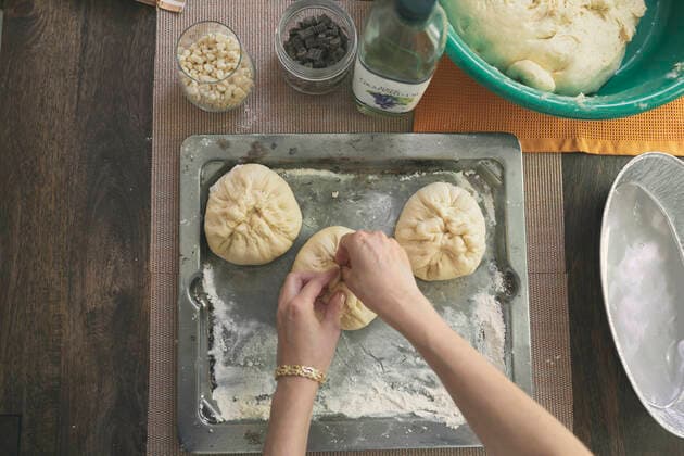 Cropped image of hands kneading dough for Challah bread at table Los Angeles, CA, United States ,model released, Symbolfoto CR_JAJEES200212-305459-01