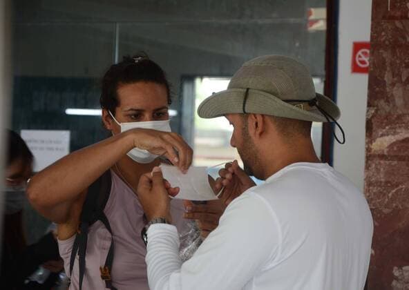 (200316) -- HANOI, March 16, 2020 -- Foreign tourists wear face masks at the railway station in Vietnam s central city of Da Nang on March 16, 2020. Vietnam has confirmed a new case of novel coronavirus infection in its central Ninh Thuan province, bringing the total number in the country to 61, the Ministry of Health said on Monday night. (VNA Handout via Xinhua) VIETNAM-COVID-19-NEW CASES HuangxShuo 