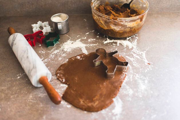 Rolled out Gingerbread Cookie Dough with Cookie Cutters Hillsdale, MI, United States CR_OMHX200220-268398-01