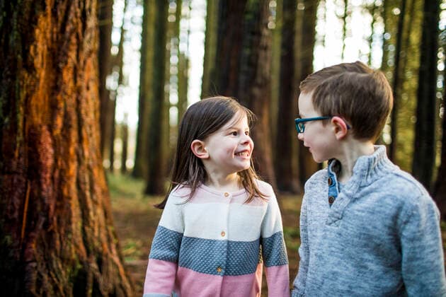 boy and girl locking eyes while playing outside. Surrey, BC, Canada ,model released, Symbolfoto CR_JDIP200224B-310167-01