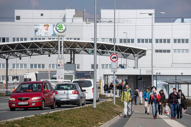 Employees last morning shift of Czech car-maker Skoda Auto leave Skoda Auto s plant in Kvasiny, Czech Republic, after decision to shutdown of the plant in relation to coronavirus outbreak, on March 18, 2020. (CTKxPhoto DavidxTanecek) CTKPhotoP202003180724801 TAD 023