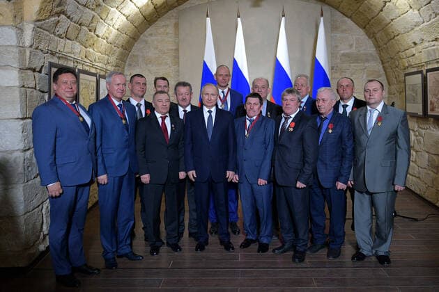 SEVASTOPOL, RUSSIA - MARCH 18, 2020: Russia s President Vladimir Putin (C) poses with participants in a ceremony to present state decorations at the Konstantinovskaya Batareya Konstantin Battery Museum and Exhibition Centre. Alexei Druzhinin Russian Presidential Press and Information Office TASS  TS0D2A49