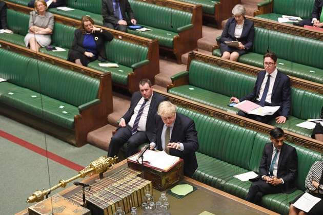 (200318) -- LONDON, March 18, 2020 (Xinhua) -- British Prime Minister Boris Johnson (Front) attends the Prime Minister s Questions at the House of Commons in London, Britain, on March 18, 2020. British Prime Minister indicated Wednesday night that he is sticking to the timetable that will see Britain and European Union (EU) end the Brexit transition period at the end of this year. (Jessica Taylor UK Parliament Handout via Xinhua) HOC MANDATORY CREDIT: UK Parliament Jessica Taylor BRITAIN-LONDON-PMQS-BREXIT 