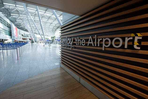 An empty check-in area in the terminal at Duesseldorf Airport, due to the corona virus only a few passengers are on their way, Duesseldorf Airport,18 03 2020