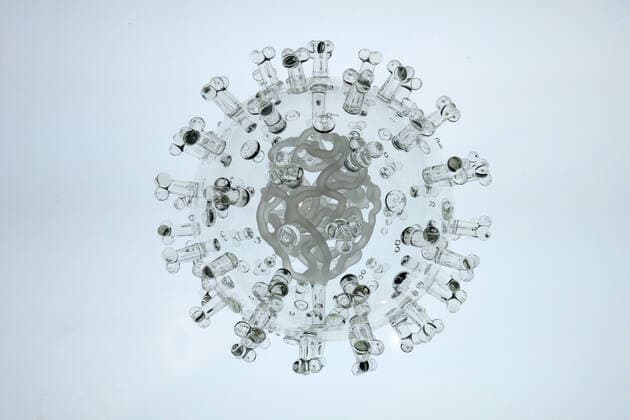 March 19, 2020, Bristol, United Kingdom: IN PHOTO: COVID-19 coronavirus..Internationally-renowned British artist Luke Jerram has created a coronavirus glass sculpture in tribute to the huge global scientific and medical effort to combat the pandemic...Made in glass, at 23cm in diameter, it is 1 million times larger than the actual virus. ..It was commissioned 5 weeks ago by a university in America to reflect its current and future research and learning in health, the environment and intelligent systems, and its focus on solving global challenges. ..Luke says: Ã¢â‚¬oeHelping to communicate the form of the virus to the public, the artwork has been created as an alternative representation to the artificially coloured imagery received through the media. In fact, viruses have no colour as they are smaller than the wavelength of light.Ã¢â‚¬Â - ZUMAc218 20200319_zia_c218_030 Copyright: xCOVERxImagesx