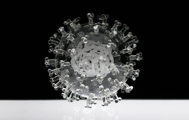 March 19, 2020, Bristol, United Kingdom: IN PHOTO: COVID-19 coronavirus..Internationally-renowned British artist Luke Jerram has created a coronavirus glass sculpture in tribute to the huge global scientific and medical effort to combat the pandemic...Made in glass, at 23cm in diameter, it is 1 million times larger than the actual virus. ..It was commissioned 5 weeks ago by a university in America to reflect its current and future research and learning in health, the environment and intelligent systems, and its focus on solving global challenges. ..Luke says: Ã¢â‚¬oeHelping to communicate the form of the virus to the public, the artwork has been created as an alternative representation to the artificially coloured imagery received through the media. In fact, viruses have no colour as they are smaller than the wavelength of light.Ã¢â‚¬Â - ZUMAc218 20200319_zia_c218_031 Copyright: xCOVERxImagesx