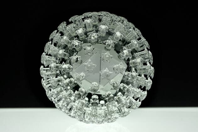 March 19, 2020, Bristol, United Kingdom: IN PHOTO: Papiloma..Internationally-renowned British artist Luke Jerram has created a coronavirus glass sculpture in tribute to the huge global scientific and medical effort to combat the pandemic...Made in glass, at 23cm in diameter, it is 1 million times larger than the actual virus. ..It was commissioned 5 weeks ago by a university in America to reflect its current and future research and learning in health, the environment and intelligent systems, and its focus on solving global challenges. ..Luke says: Ã¢â‚¬oeHelping to communicate the form of the virus to the public, the artwork has been created as an alternative representation to the artificially coloured imagery received through the media. In fact, viruses have no colour as they are smaller than the wavelength of light.Ã¢â‚¬Â ..Ã¢â‚¬oeThi - ZUMAc218 20200319_zia_c218_041 Copyright: xCOVERxImagesx