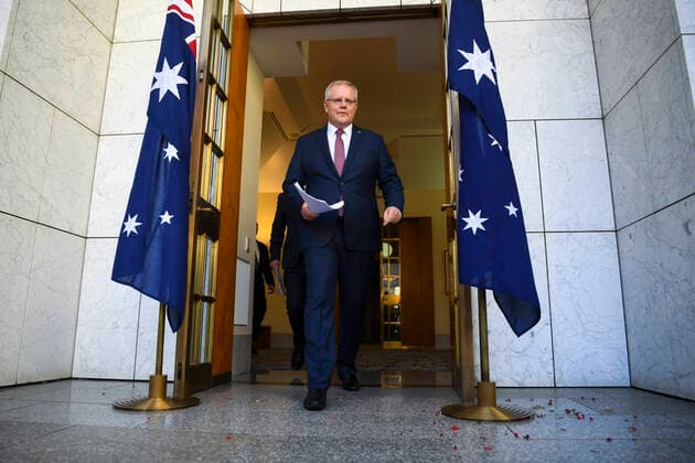 SCOTT MORRISON CORONAVIRUS PRESSER, Australian Prime Minister Scott Morrison arrives to speak to the media during a press conference at Parliament House in Canberra, Friday, March 20, 2020. ( NO ARCHIVING, EDITORIAL USE ONLY, NO USE IN BOOKS WITHOUT CONSENT CANBERRA ACT AUSTRALIA  Copyright: xLUKASxCOCHx 20200320001458331282