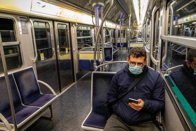 (200320) -- PARIS, March 20, 2020 (Xinhua) -- A man wearing a mask takes the metro in Paris, France, March 19, 2020. One hundred and eight COVID-19 patients died in 24 hours in France, taking the country s death toll to 372, and total confirmed cases to 10,995, Director-General of Health Jerome Salomon said Thursday in a daily update. (Photo by Aurelien Morissard Xinhua) FRANCE-PARIS-COVID-19 
