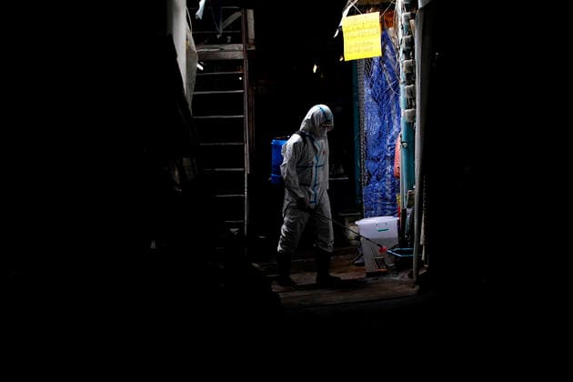 March 20, 2020, Bangkok, Thailand: Thai officials spray disinfectant at Pet market during a precaution against the coronavirus Covid-19 outbreak in Bangkok on March 20, 2020. Total number of deaths stemming from the growing pandemic at 10,030. The number of people infected worldwide is nearing 245,000 with most cases in China, followed by Italy and Iran, according to its data. Bangkok Thailand - ZUMAu103 20200320_zia_u103_003 Copyright: xUrdeexImagex