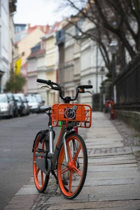 Corona pandemic, impact of public life Rental bicycles stand unused in the deserted, deserted Sophienstrasse in Berlin Mitte The street Sophienstrasse in Berlin Mitte is virtually deserted, here it is evident that the orders on behaviour are also being implemented Rental bicycles Corona pandemic Orders public life impact