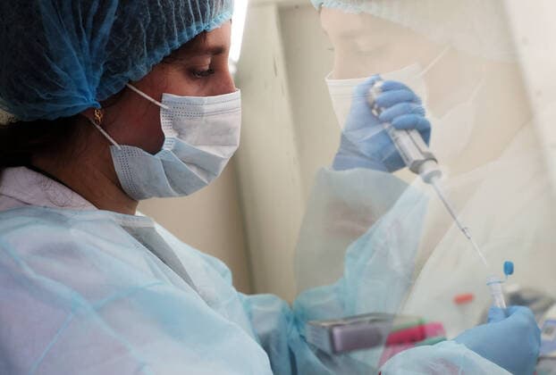 ULYANOVSK, RUSSIA - MARCH 20, 2020: An employee at the TestGene company developing and manufacturing molecular genetics test kits. Yegor Aleyev TASS  TS0D2E28