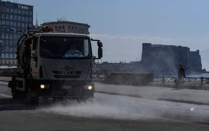 Sanitary workers disinfect the streets, in Naples city to counter the danger of a coronavirus infection (COVID 19).  Copyright: xSalvatorexLaportax xIPAx xKontrolabx