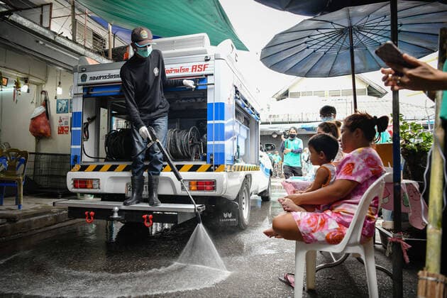 March 20, 2020, Bangkok, Thailand: A worker dressed in a protective suite sprays disinfectants as a preventive measure against the spread of Coronavirus at the Chatuchak Weekend Market in Bangkok..Thailand has so far reported 322 cases of COVID-19 coronavirus with most of the cases reported in the Capital city of Bangkok. Bangkok Thailand - ZUMAs197 20200320_zaa_s197_024 Copyright: xAmpholxThongmueangluangx