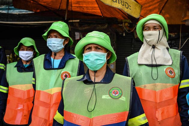 March 20, 2020, Bangkok, Thailand: Volunteers wearing protective masks gather to clean the Chatuchak Weekend Market as a preventive measure against the spread of Coronavirus in Bangkok..Thailand has so far reported 322 cases of COVID-19 coronavirus with most of the cases reported in the Capital city of Bangkok. Bangkok Thailand - ZUMAs197 20200320_zaa_s197_026 Copyright: xAmpholxThongmueangluangx