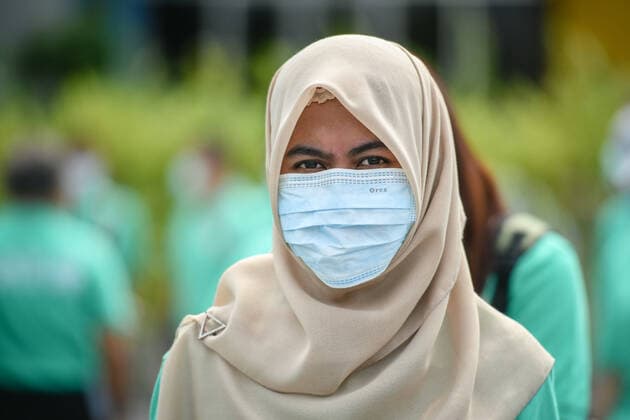 March 20, 2020, Bangkok, Thailand: A woman wears a protective mask as a preventive measure against the spread of Coronavirus at the Chatuchak Weekend Market in Bangkok..Thailand has so far reported 322 cases of COVID-19 coronavirus with most of the cases reported in the Capital city of Bangkok. Bangkok Thailand - ZUMAs197 20200320_zaa_s197_028 Copyright: xAmpholxThongmueangluangx