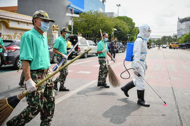March 20, 2020, Bangkok, Thailand: Volunteers wearing protective masks and gloves gather to clean the Chatuchak Weekend Market as a preventive measure against the spread of Coronavirus in Bangkok..Thailand has so far reported 322 cases of COVID-19 coronavirus with most of the cases reported in the Capital city of Bangkok. Bangkok Thailand - ZUMAs197 20200320_zaa_s197_034 Copyright: xAmpholxThongmueangluangx