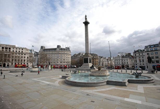 An almost deserted Trafalgar Square at 1.37pm as many tourists and sightseers seem to have not ventured out. The COVID-19 Coronavirus pandemic crisis continues, and although there is no lockdown in London, some changes to public transport have been made as there seems to be fewer people and tourists moving around the city. COVID-19 Coronavirus crisis, London, UK on March 20, 2020 