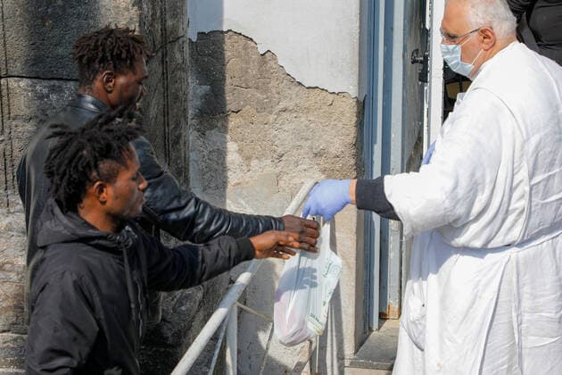 March 20, 2020, Naples, CAMPANIA, ITALY: Italy-20 03 2020 Naples, during the pandemic of the covid-19 virus, the streets are empty both in the center and in the suburbs but the inconvenience for citizens with garbage heaps begins, the lack of food for the less well-off. Now the military arrives, but the Neapolitans do not afflict themselves and respond with flags and banners from the balconies. Naples ITALY - ZUMAs236 20200320_zap_s236_056 Copyright: xFabioxSassox