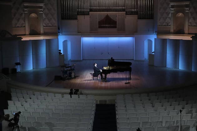 MOSCOW, RUSSIA - MARCH 20, 2020: Pianist Denis Matsuev performs during a live broadcast from the empty Tchaikovsky Concert Hall. The Russian Culture Ministry advised to suspend public events due to the COVID-19 coronavirus pandemic. Valery Sharifulin TASS  TS0D2EB3