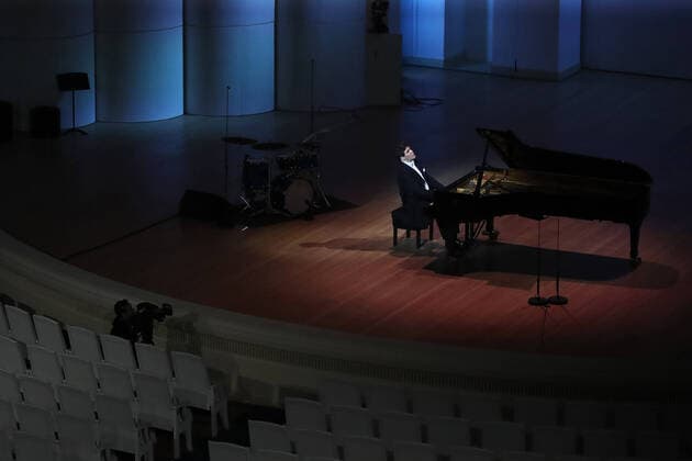 MOSCOW, RUSSIA - MARCH 20, 2020: Pianist Denis Matsuev performs during a live broadcast from the empty Tchaikovsky Concert Hall. The Russian Culture Ministry advised to suspend public events due to the COVID-19 coronavirus pandemic. Valery Sharifulin TASS  TS0D2EB5