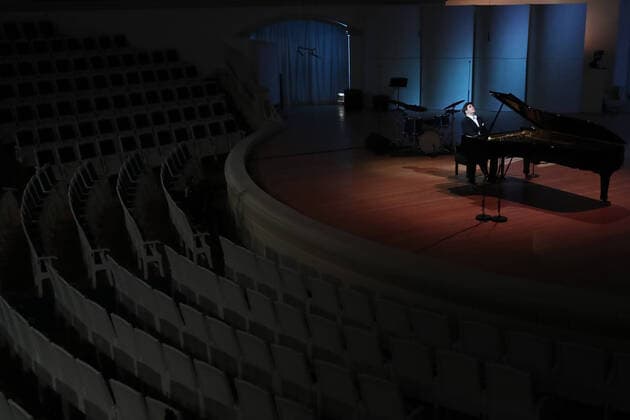 MOSCOW, RUSSIA - MARCH 20, 2020: Pianist Denis Matsuev performs during a live broadcast from the empty Tchaikovsky Concert Hall. The Russian Culture Ministry advised to suspend public events due to the COVID-19 coronavirus pandemic. Valery Sharifulin TASS  TS0D2EBC