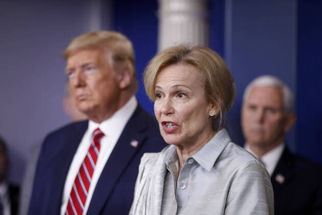 Deborah Birx, coronavirus response coordinator, speaks as U.S. President Donald Trump, left, listens during a Coronavirus Task Force news conference in the briefing room of the White House in Washington, DC on Friday, March 20, 2020. Americans will have to practice social distancing for at least several more weeks to mitigate U.S. cases of Covid-19, Anthony S. Fauci of the National Institutes of Health said today.  WAX20200320933 ALxDRAGO