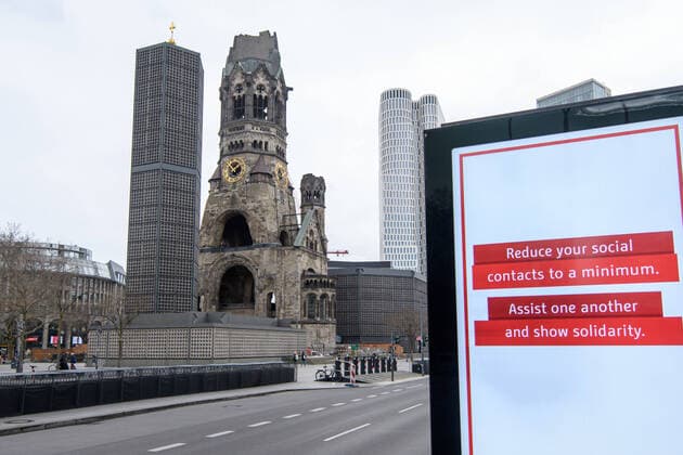 Coronavirus, Impressions from Berlin Germany, Berlin 20 03 2020 The picture shows a sign with instructions on how to behave in corona times and in the background you can see the Kaiser Wilhelm Memorial Church Berlin Berlin Germany