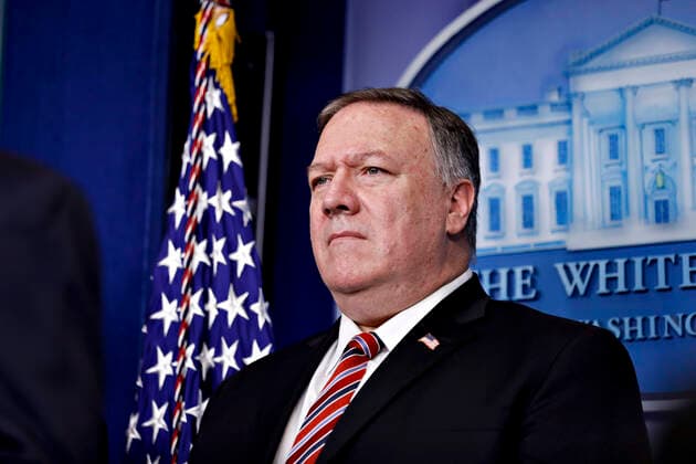 United States Secretary of State Mike Pompeo, listens during a Coronavirus Task Force news conference in the briefing room of the White House in Washington, D.C., U.S., on Friday, March 20, 2020. Americans will have to practice social distancing for at least several more weeks to mitigate U.S. cases of Covid-19, Director of the National Institute of Allergy and Infectious Diseases at the National Institutes of Health Dr. Anthony Fauci said today. Copyright: xAlxDragox