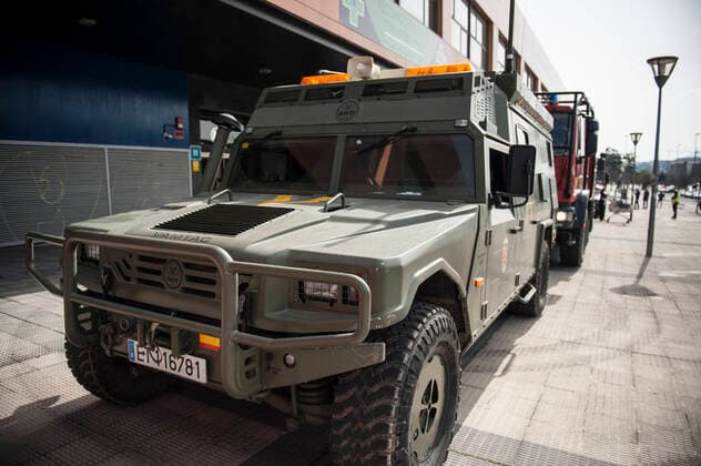 March 20, 2020, Pamplona, Navarra, Spain: Military truck belonging to the Spanish Military Emergency Unit during the disinfection tasks at the Pamplona Immigration Office..A total of four self-bomb trucks and 15 military personnel wearing protective equipment continue the disinfection work entrusted to the Spanish Military Emergency Unit by the Ministry of Interior, in areas that could have been infected with the coronavirus Pamplona Spain - ZUMAs197 20200320_zaa_s197_101 Copyright: xElsaxAxBravox