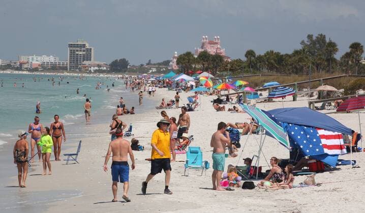 March 20, 2020, St. Pete Beach, Florida, USA: People pack Pass-A-Grille Beach, St. Pete Beach, despite warnings from officials to distance themselves from others due to the Coronavirus outbreak, Friday, March 20, 2020. Pinellas County officials are closing public beaches at midnight, Friday. The view is looking north. St. Pete Beach USA - ZUMAs70_ 20200320_zan_s70_013 Copyright: xScottxKeelerx