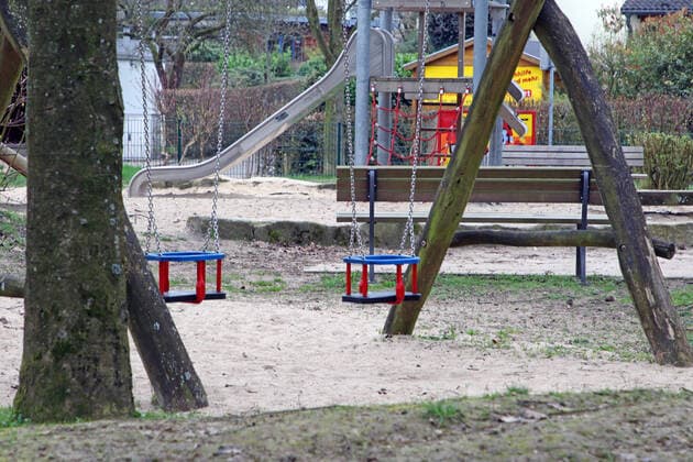 Fear of the corona virus A childrens playground has been closed due to the corona crisis and may no longer be used Essen North Rhine-Westphalia Germany