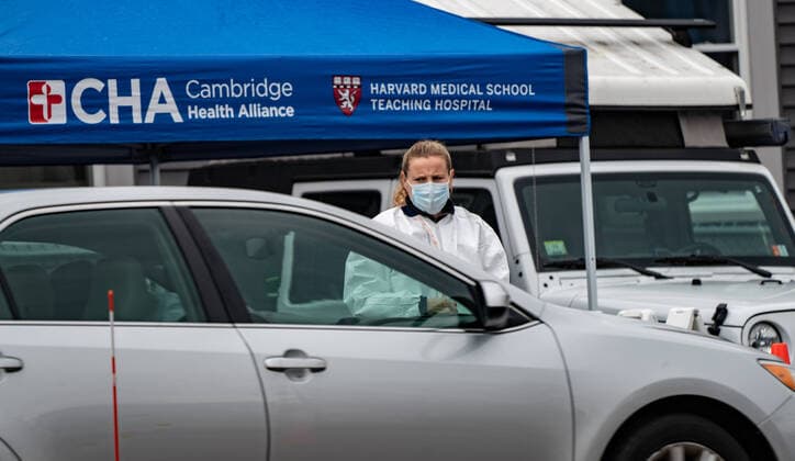 March 20, 2020, Somerville Hospital, Somerville, Massachusetts, USA: A health worker at drive-thru coronavirus disease testing site at Somerville Hospital in Somerville, Massachusetts.  (124584560)