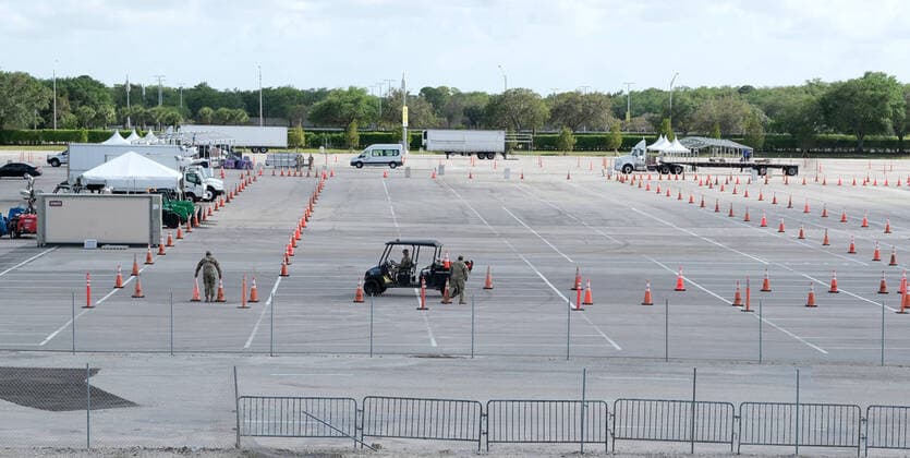 The Army Corps of Engineers set up a parking lot for Coronavirus testing and staging of the Florida National Guard at the Hard Rock Stadium on Friday, March 20, 2020 in Miami, Florida. This test site is scheduled to handle Miami area residents to help identify the Coronavirus Pandemic.  MIA20200320105 GARYxIxROTHSTEIN