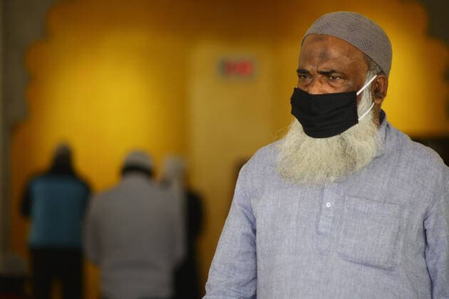 Impact of COVID-19 at Kathmandu A Nepalese Muslim man wearing a face masks as a precaution against Coronavirus (COVID-19) outbreak attends Friday prayers at a Jame mosque in Kathmandu, Nepal on Friday, March 20, 2020. Kathmandu Bagmati Nepal Copyright: SubashxShrestha