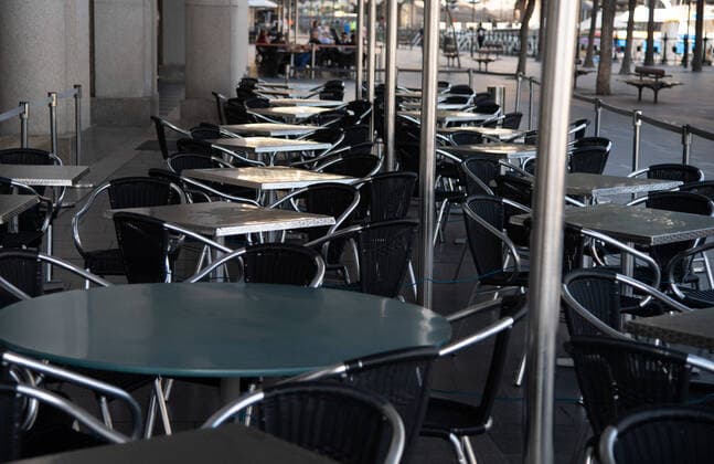 CORONAVIRUS AUSTRALIA, Empty tables at a restaurant in Circular Quay, Sydney, Saturday, March 21, 2020. Sydney is seeing a dramatic reduction in people on the streets as people are asked to enact social distancing and self isolation in order to prevent the spread of Covid-19. ( NO ARCHIVING, EDITORIAL USE ONLY, NO USE IN BOOKS WITHOUT CONSENT SYDNEY NSW AUSTRALIA  Copyright: xJAMESxGOURLEYx 20200321001458535823