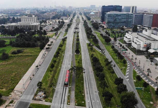 (200321) -- BOGOTA, March 21, 2020 (Xinhua) -- Empty roads are seen in Bogota, Colombia, March 20, 2020. The Colombian capital of Bogota began on Friday the mandatory isolation drill decreed by mayor Claudia Lopez in order to prepare for a quarantine aimed at containing the COVID-19 pandemic. The mandatory isolation drill in the Colombian capital, home to more than seven million people and where 56 of Colombia s 145 cases of COVID-19 have been confirmed, will remain in effect until midnight on March 23. (Photo by Jhon Paz Xinhua) COLOMBIA-BOGOTA-MANDATORY ISOLATION 