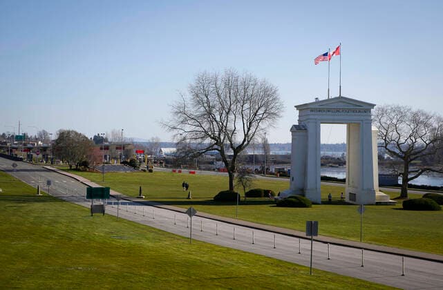 (200321) -- VANCOUVER, March 21, 2020 (Xinhua) -- Empty road at the U.S. port of entry into Blaine of Washington State is seen at Douglas-Peace Arch border crossing in Surrey, Canada, March 20, 2020. Canadian Prime Minister Justin Trudeau announced that the Canada-U.S. border will close to non-essential travel at midnight Friday and both countries will turn back asylum seekers crossing the border. (Photo by Liang Sen Xinhua) CANADA-U.S.-BORDER CLOSE-COVID-19 