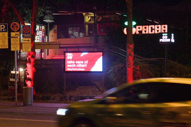 Theme picture Corona Pandemic Bavaria decides on exit restrictions Closed Club PACHA in Munich late in the evening before the exit restrictions are imposed on 20 03 2020 Illuminated sign TAKE CARE OF EACH OTHER