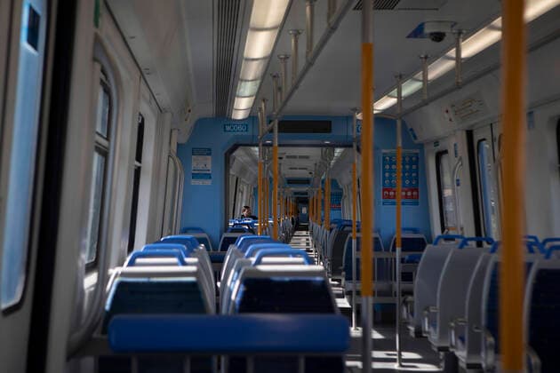 (200321) -- BUENOS AIRES, March 21, 2020 (Xinhua) -- Few passengers are seen on a train in Buenos Aires, Argentina, March 20, 2020. Argentine President Alberto Fernandez asked the people to unite and comply with the mandatory quarantine placed until March 31 to help combat the novel coronavirus pandemic. The country has so far reported 158 cases, three of them fatal. (Xinhua Martin Zabala) ARGENTINA-BUENOS AIRES-COVID-19-MANDATORY QUARANTINE 