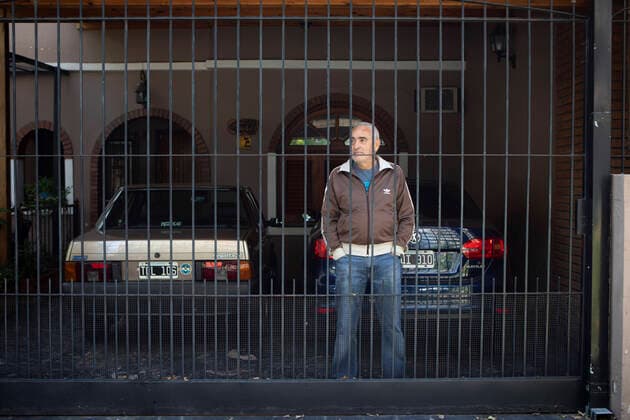 (200321) -- BUENOS AIRES, March 21, 2020 (Xinhua) -- A man stays inside a building in Buenos Aires, Argentina, March 20, 2020. Argentine President Alberto Fernandez asked the people to unite and comply with the mandatory quarantine placed until March 31 to help combat the novel coronavirus pandemic. The country has so far reported 158 cases, three of them fatal. (Xinhua Martin Zabala) ARGENTINA-BUENOS AIRES-COVID-19-MANDATORY QUARANTINE 